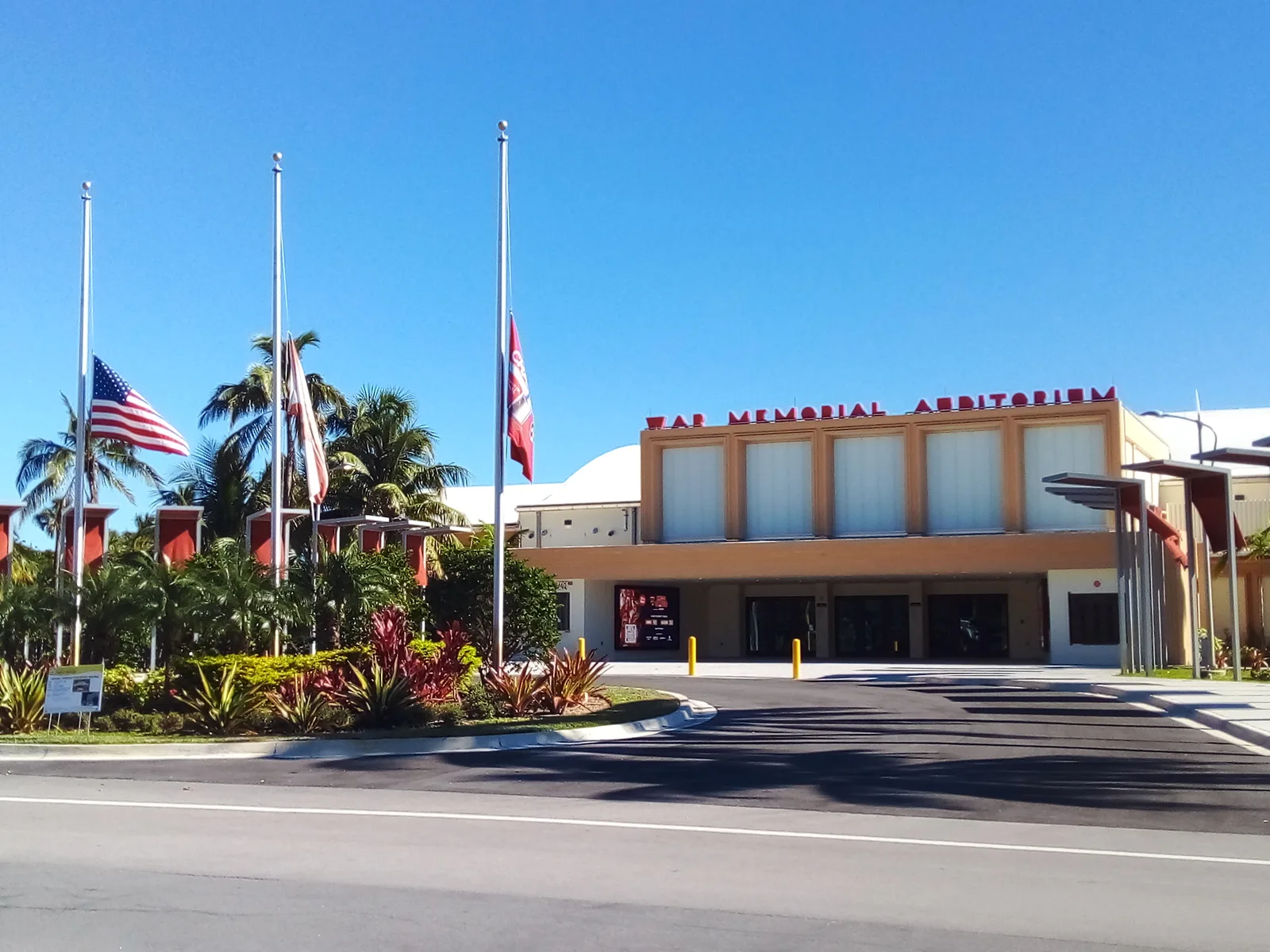 Flags at half-staff outside the War Memorial Auditorium in Holiday Park, Fort Lauderdale.