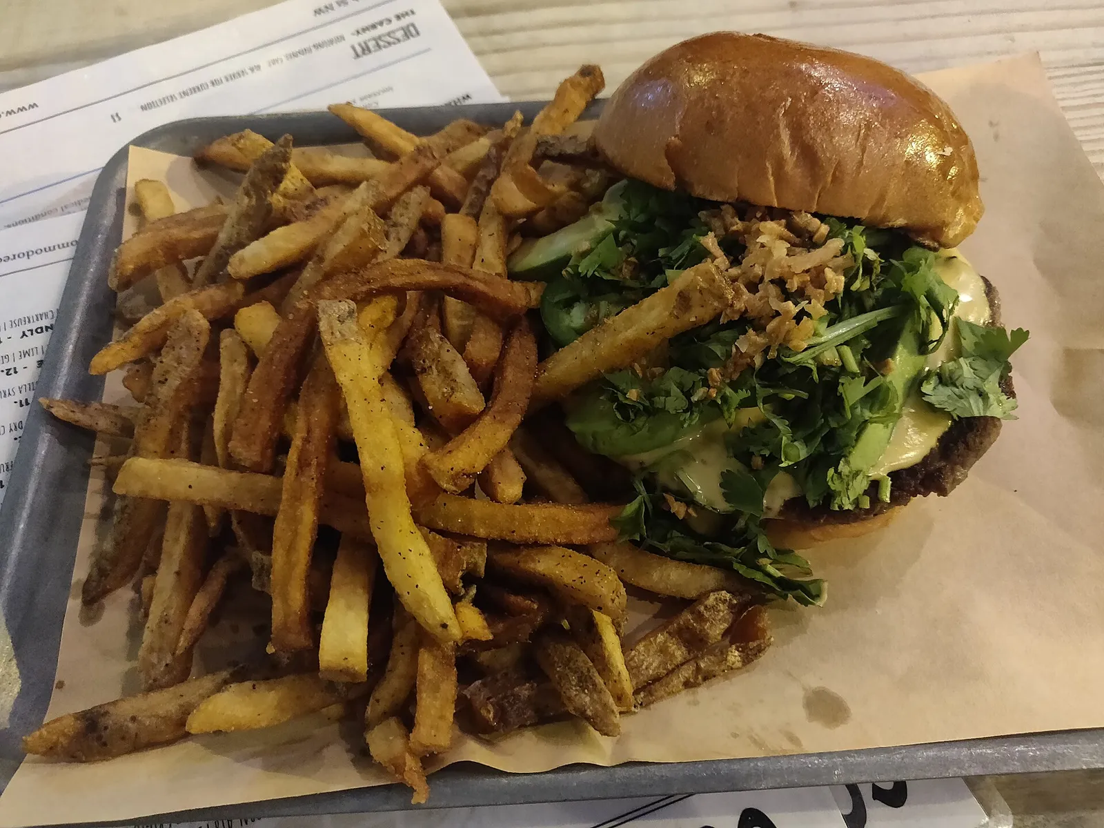 A cheeseburger and fries. The photo was not taken at a Fort Lauderdale restaurant.